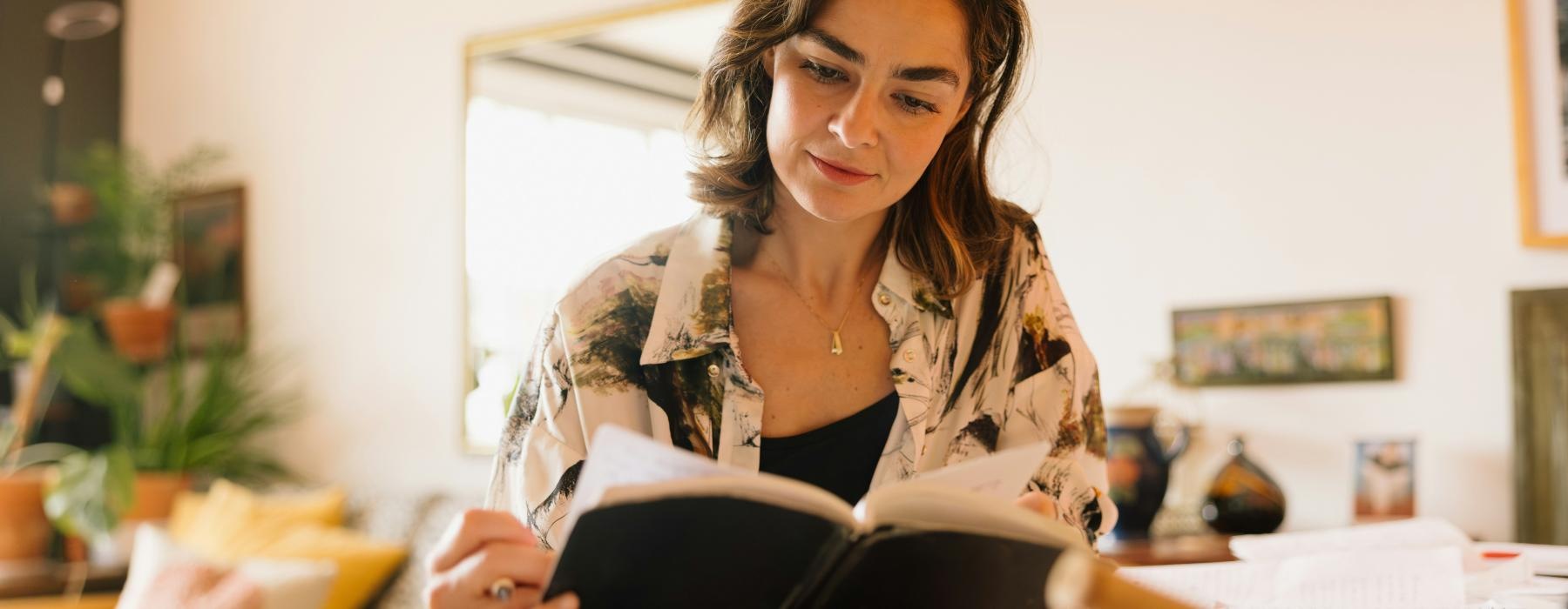 a woman sitting at a table